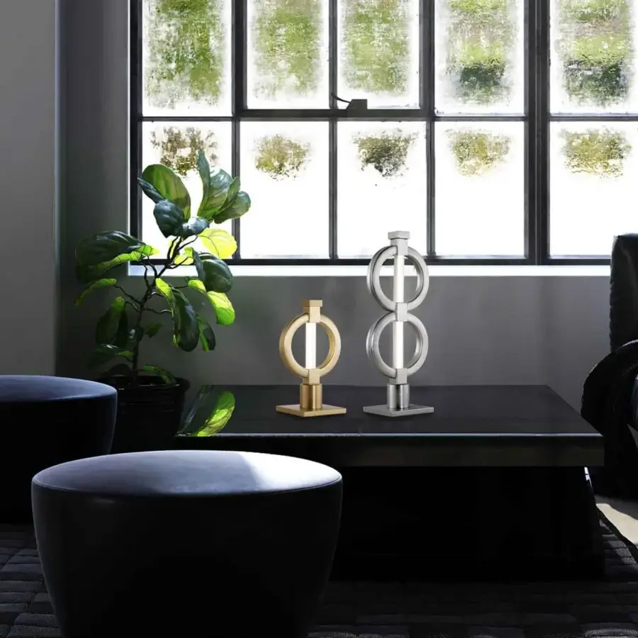 Distinguished Stillux Chain table lamp in gold crafted from refined metal with a pyrex frosted glass tube diffuser and warm finish