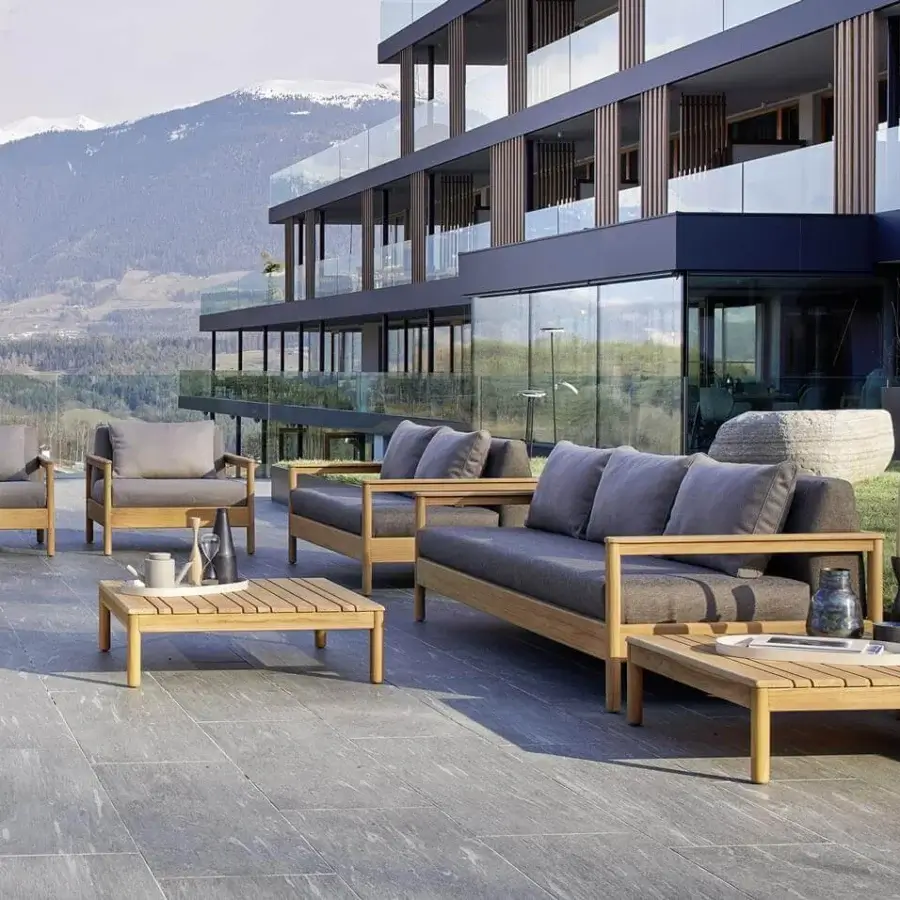 Exceptional Varaschin Bali coffee table crafted in Italy with plantation certified solid teak wood and warm toned finish