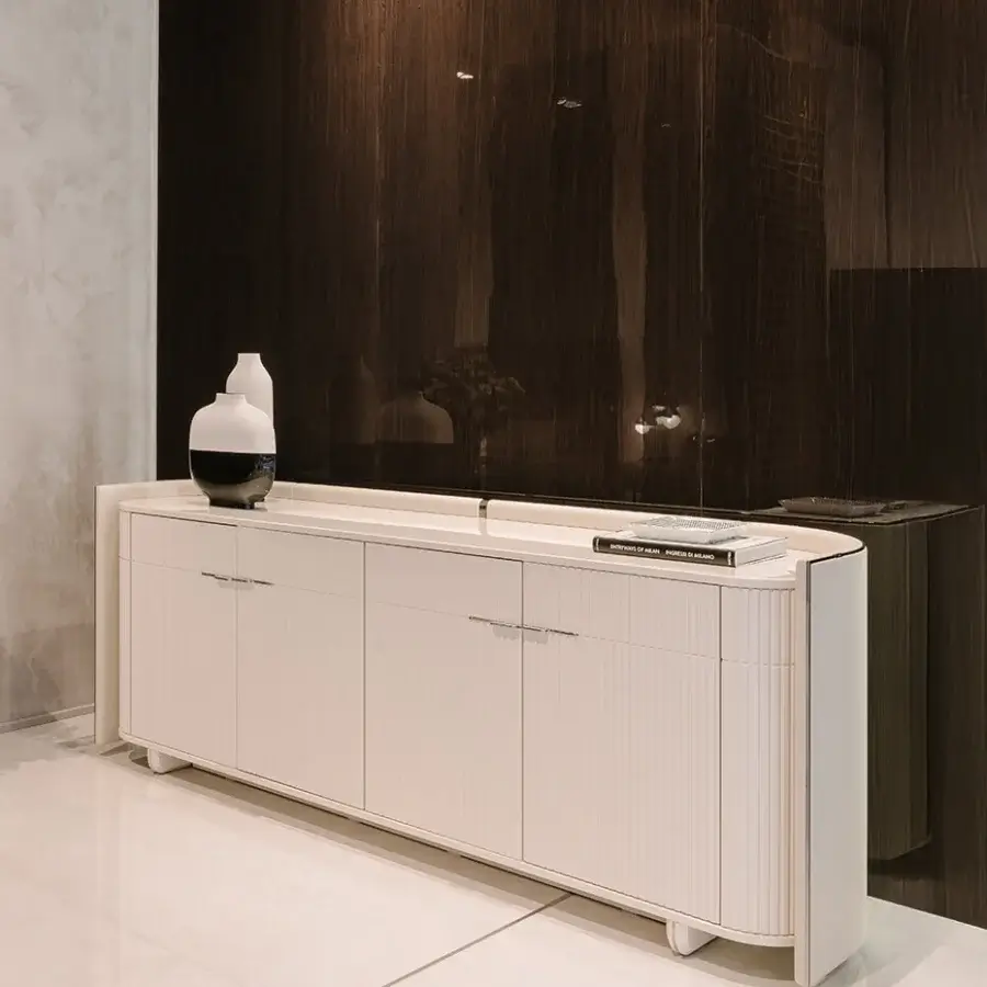 Exceptional Turri Eclipse sideboard with a curved shell crafted in hand-decorated polyester and glossy off-white leather