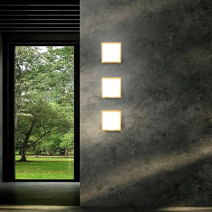 Refined Stillux Square wall lamp with a hammered metal frame and square white glass diffuser in warm gold finish