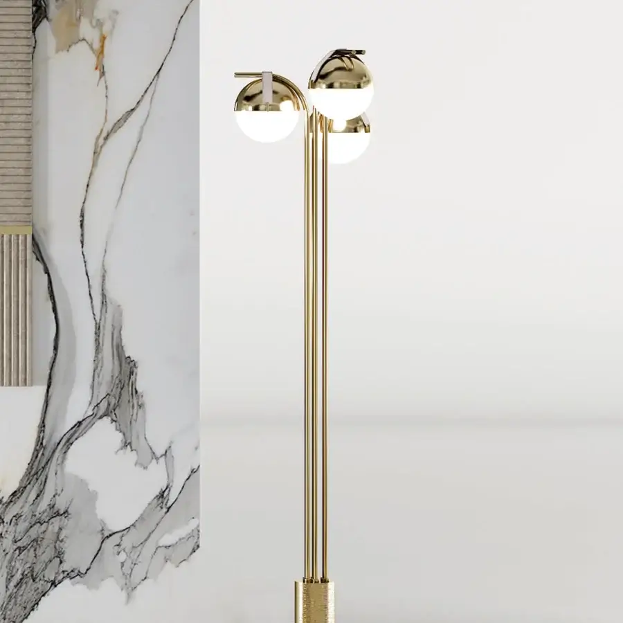 Innovative Turri Eclipse floor lamp with satin metal, curved arms supporting opaque white glass spheres and stylish leather straps in glossy golden finish