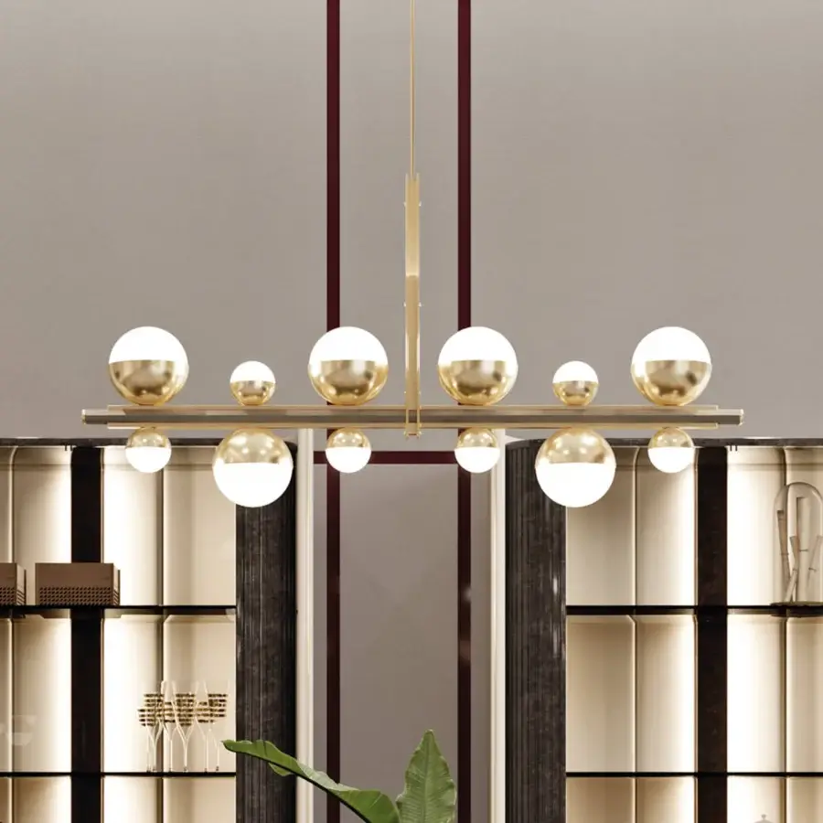 Superior Turri Eclipse suspension lamp with opaque white spheres and satin bronze metal structure