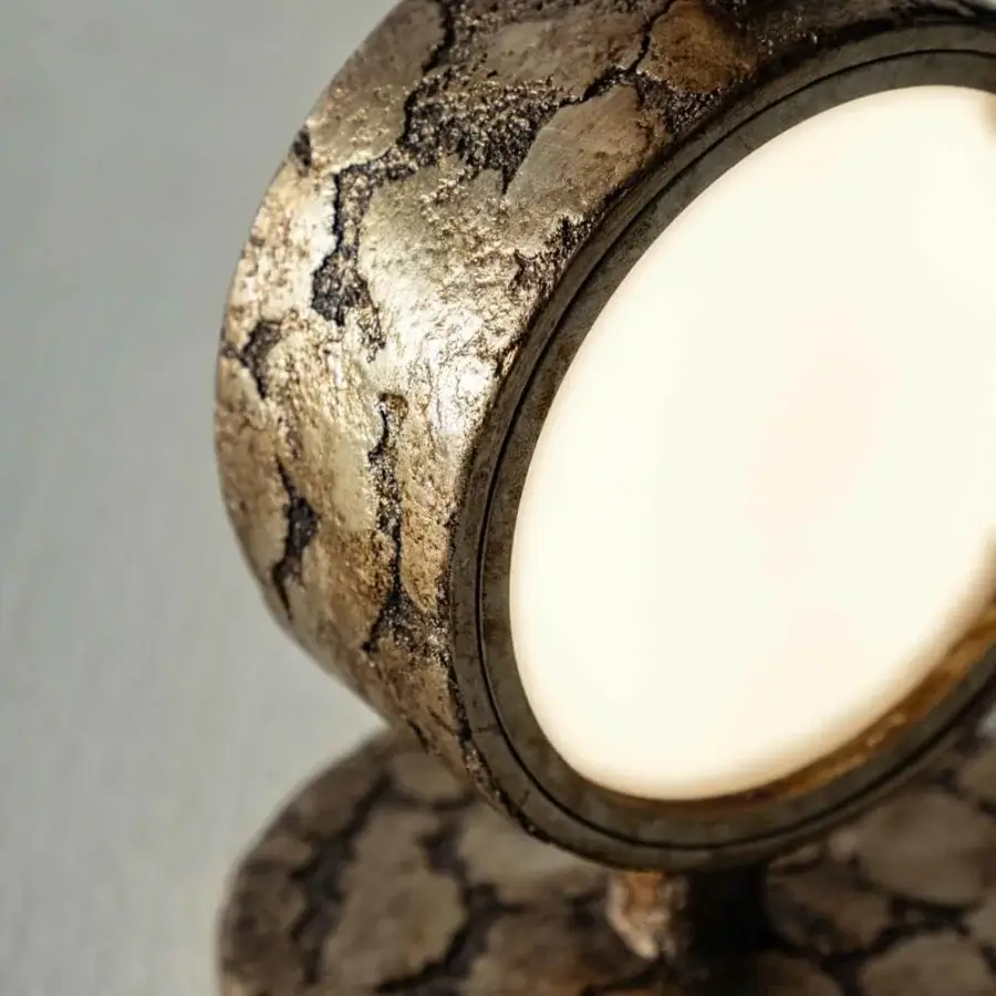Exceptional Stillux Circle table lamp with spherical glass and hammered metal in mixed gold and silver tones with dark accents