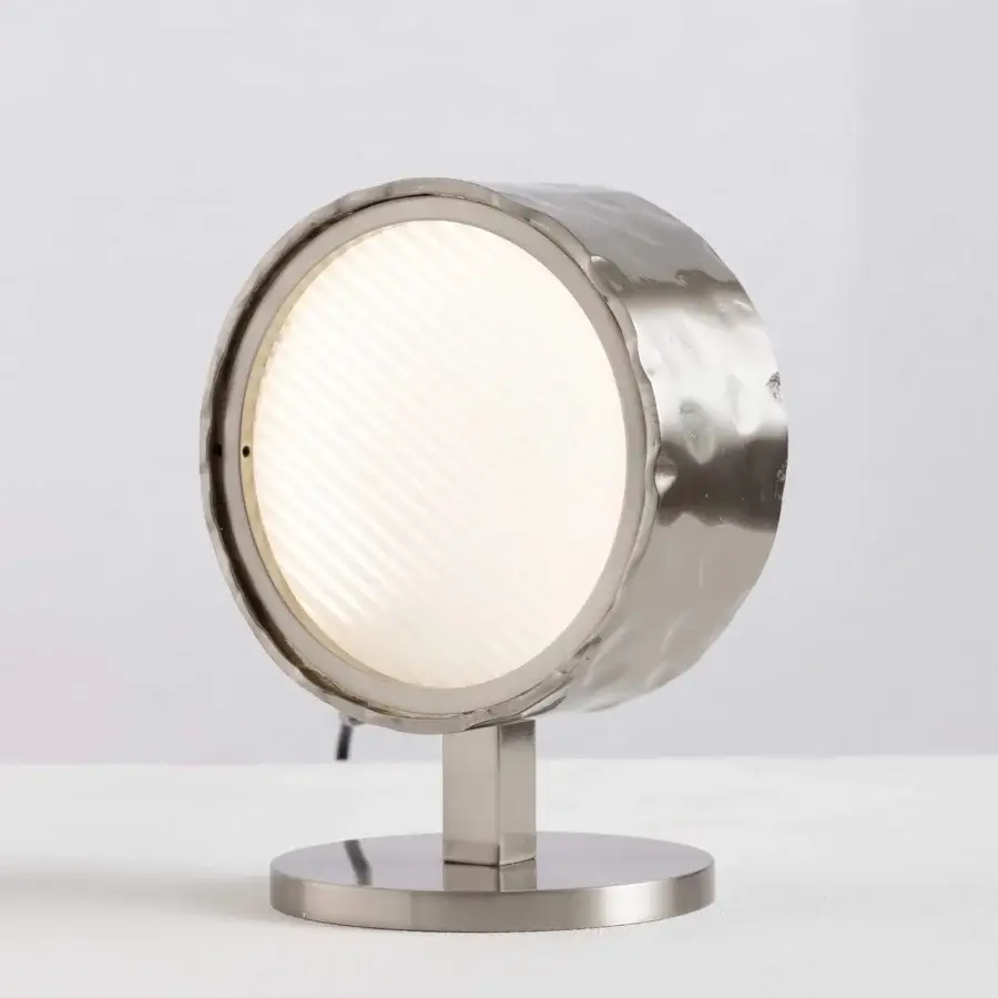 Distinguished Stillux Circle table lamp with a luminous white diffuser and hammered metal frame in satin silver finish
