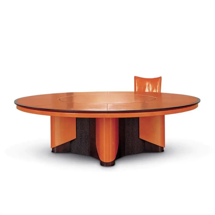 Distinguished Mascheroni Planet conference table with warm orange tones and glossy geometrically inspired base crafted in Italy