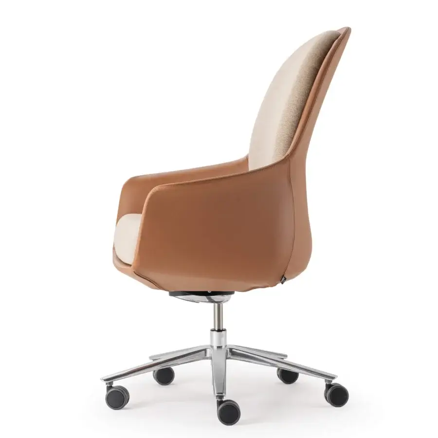 Distinctive Turri Echo armchair with welcoming light brown leather upholstery and polished metal five-leg base
