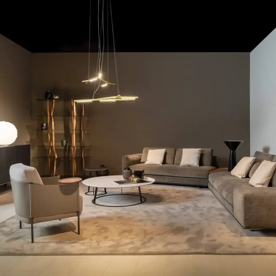 Exceptional Horm Aira suspension lamp with a gold painted brass frame exhibiting a striking linear silhouette in warm tones