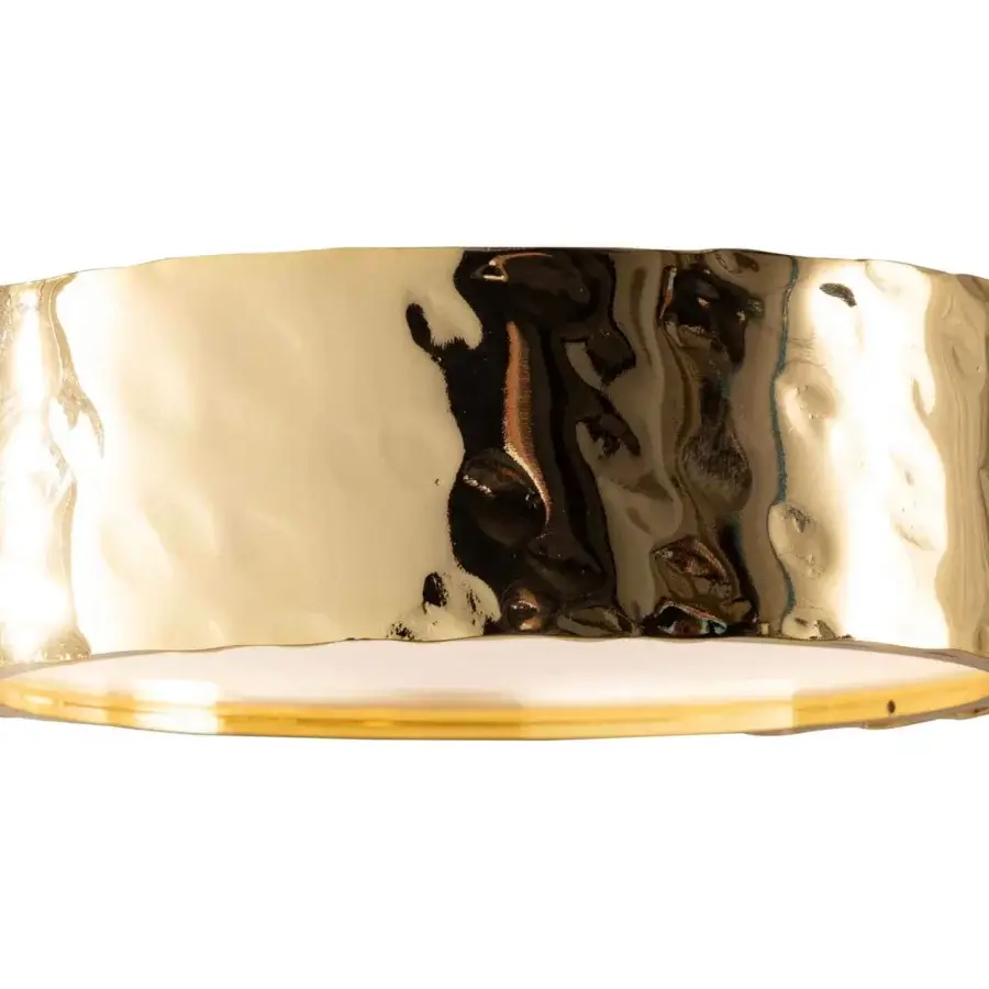 Stylish Stillux Circle wall lamp with a circular hammered metal frame in glossy gold finish