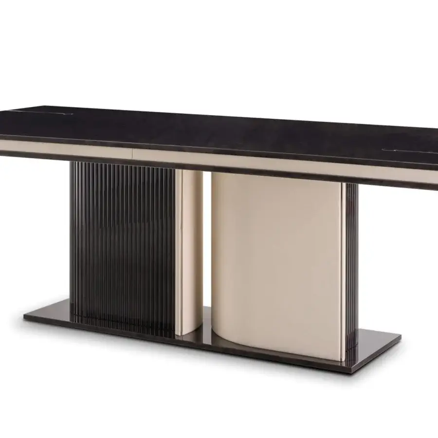 Innovative Turri Eclipse table with a dark rectangular top, gold metal details and a central base crafted in leather and grooved wood