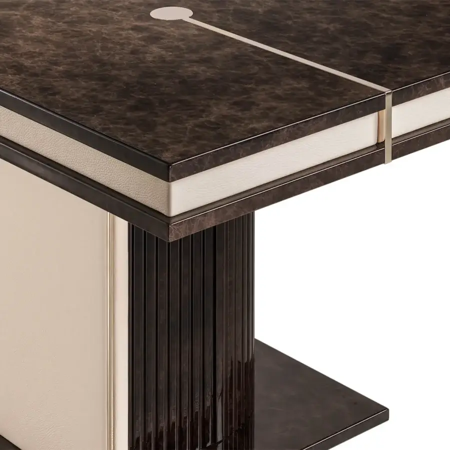 Exceptional Turri Eclipse table with a dark mottled wood-like top, light leather trim and gold metal details in a grooved wood base