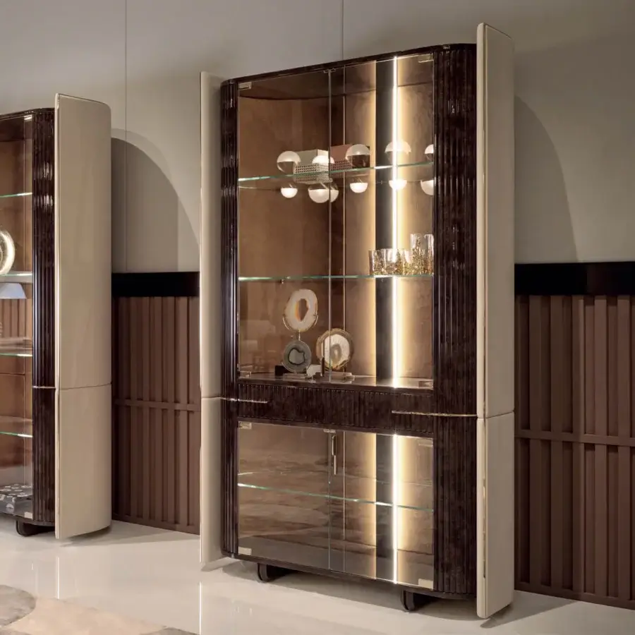 Distinguished Turri Eclipse showcase crafted in dark brown wood with glossy lacquered finish and glass doors offering views to illuminated interiors