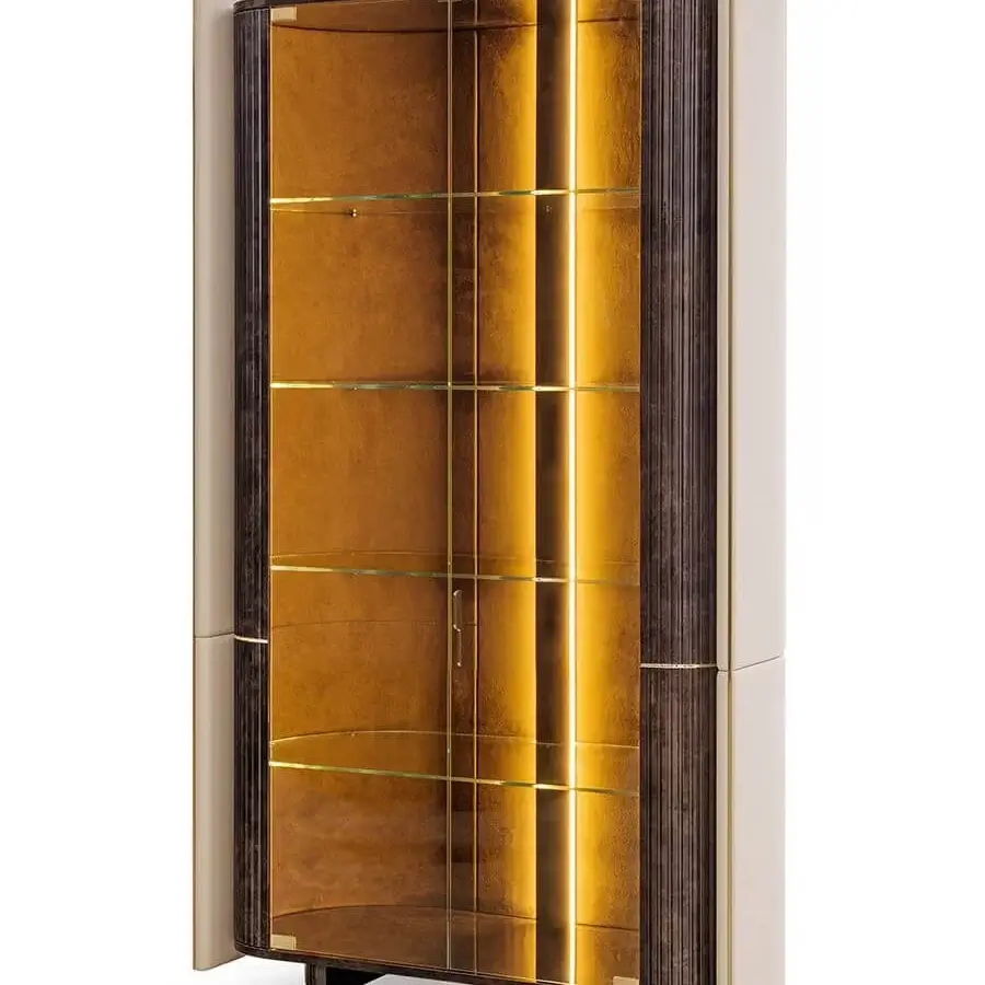 Elegant Turri Eclipse showcase with a glossy lacquered wooden structure and curved light leather shell, illuminated by golden metal supports and LED lighting