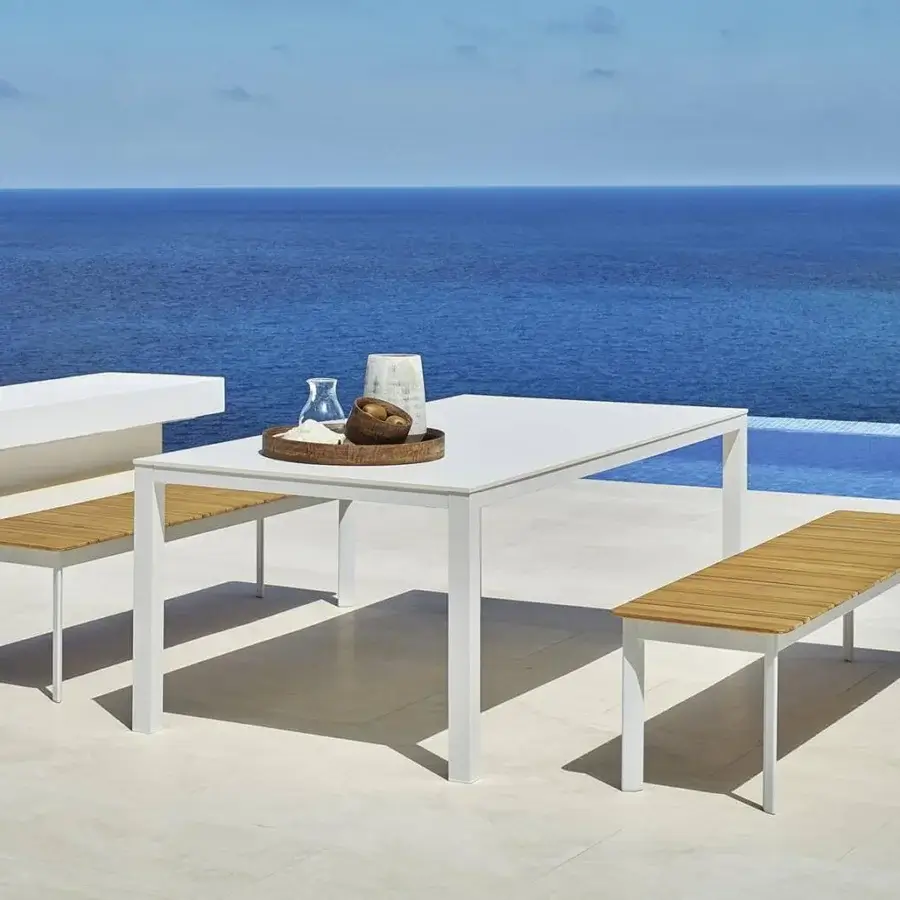 Distinguished Varaschin System Bench with white powder-coated aluminum frame and light brown teak wood seat crafted in Italy
