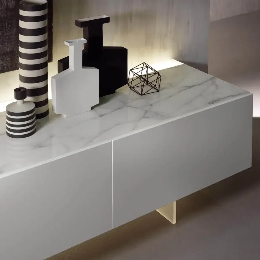 Superior Acerbis N.C sideboard with matte white body and marble-like top creates a captivating suspended rear-lighting effect