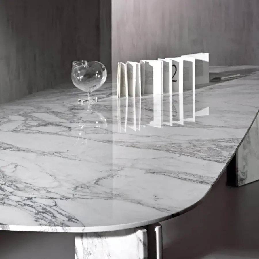Exceptional Acerbis Maxwell table with glossy white marble and contrasting stone metal legs crafted in a sleek silhouette