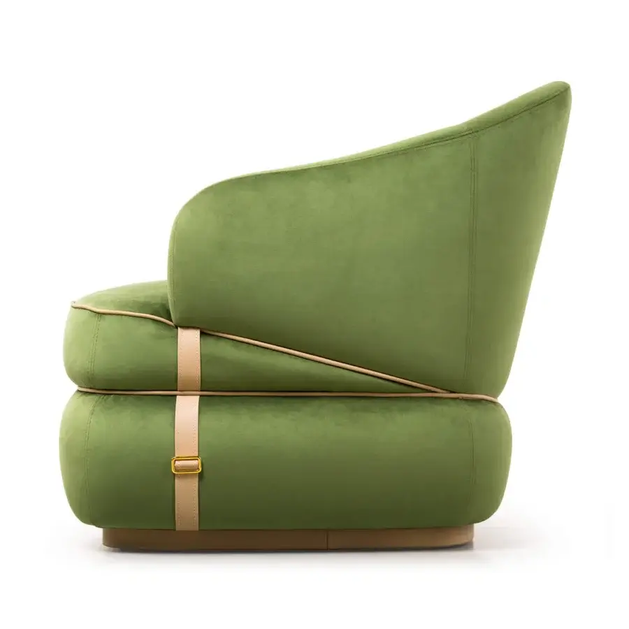 Distinguished Turri Bloom lounge chair with graceful lines upholstered in smooth green textile and light tan leather straps with wood base