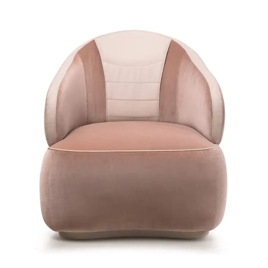 Elegant Turri Bloom lounge chair with soft lines upholstered in muted rose textile and creamy beige leather accents
