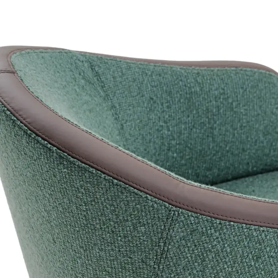 Exceptional Turri Bloom lounge chair with soft lines upholstered in textured green and blue fabric with brown leather trim