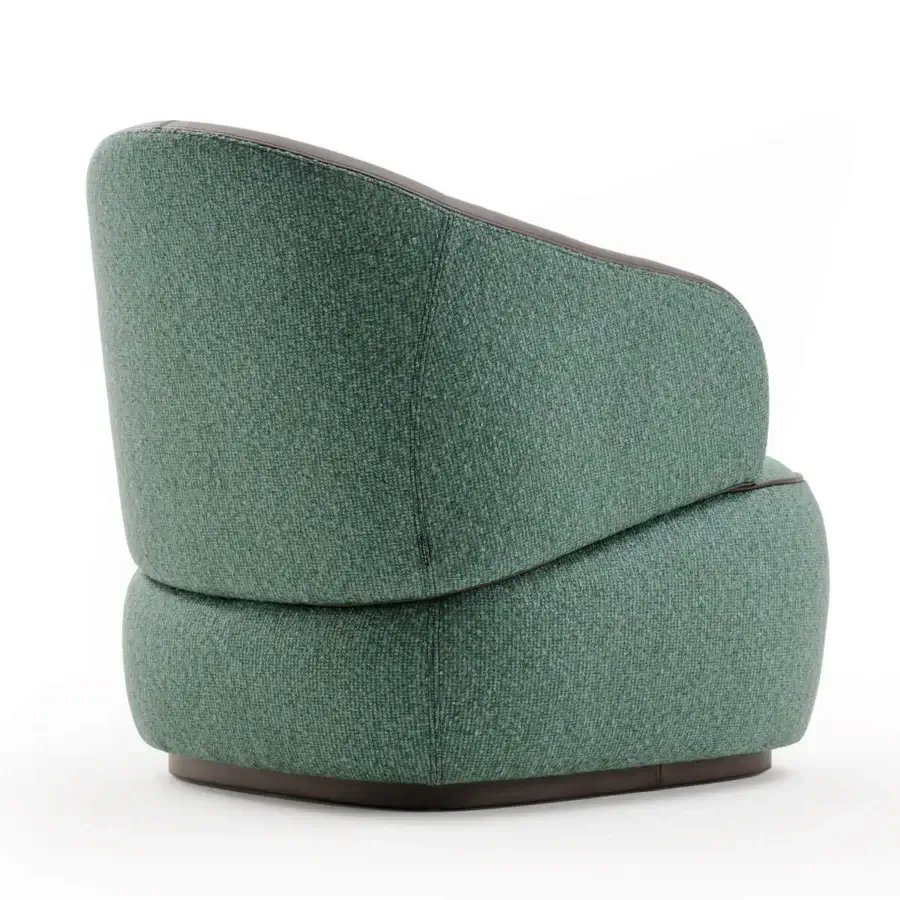Exclusive Turri Bloom lounge chair with sinuous lines upholstered in rich green woven textile and dark wood base