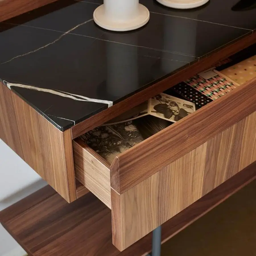 Distinguished Potocco Arial console with bronzed brass structure, Canaletto ash, and a black marble top exhibiting white veining