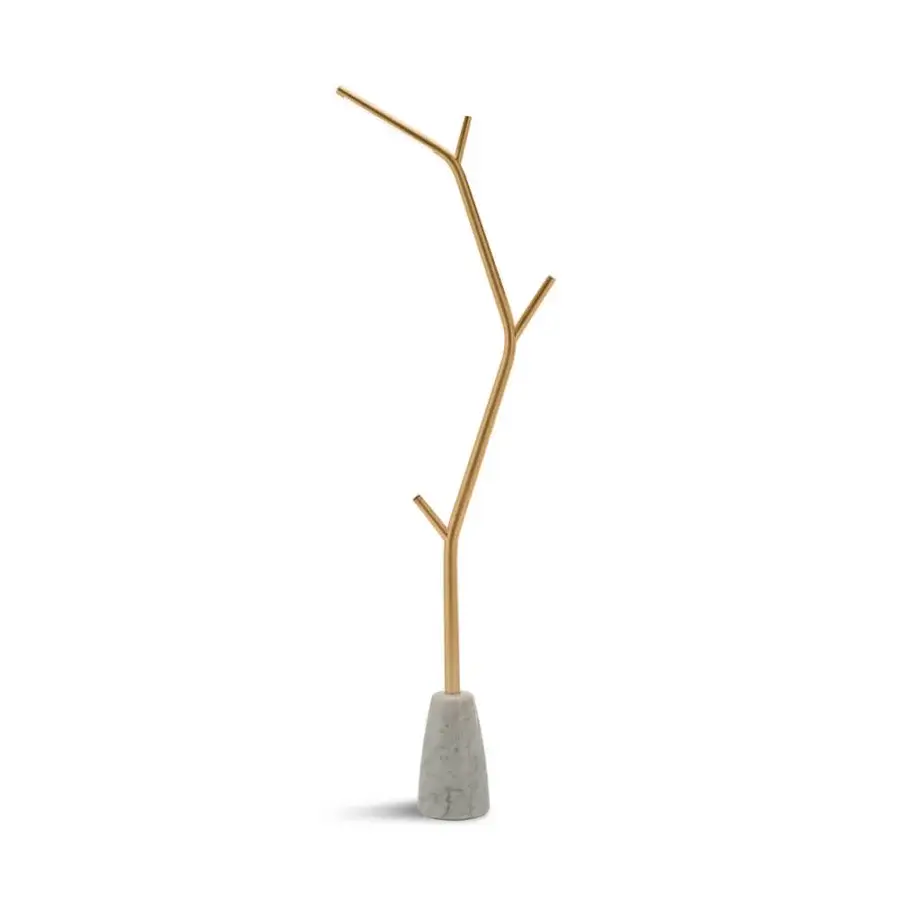 Exceptional Horm Aira floor lamp with stylized brass silhouette and light gray marble base in a luxurious gold finish