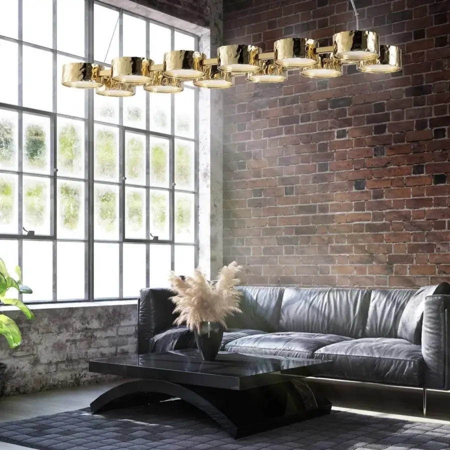 Distinguished Stillux Circle suspension lamp with circular matt white glass diffusers encased in hammered metal with a glossy golden finish