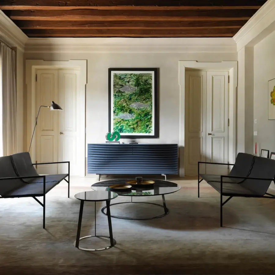 Distinguished Horm Albino Family coffee table and side table with dark glass tops and sleek black metal frames in matte finish