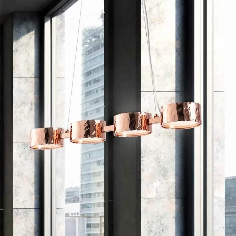 Exceptional Stillux Circle suspension lamp with four circular matt white glass diffusers encircled by warm glossy copper frames
