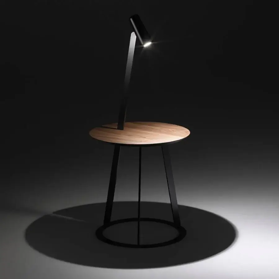 Distinguished Horm Albino Torcia side table with a wooden tray and sleek black metal structure supporting a cylindrical LED torch