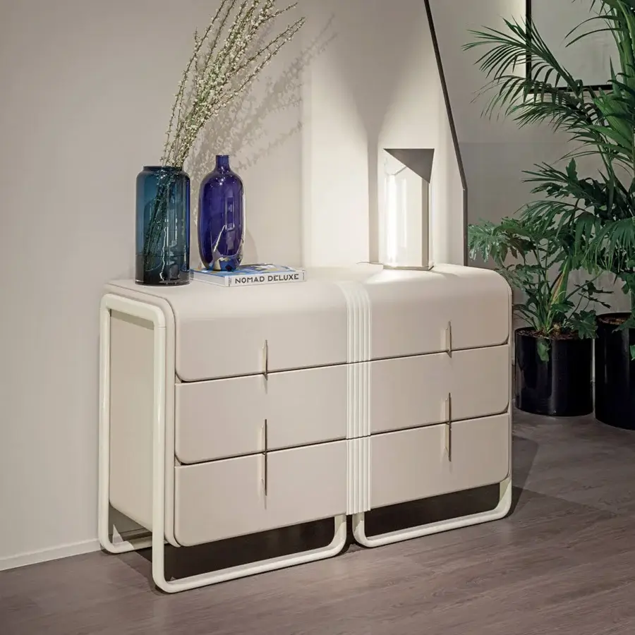 Superior Turri Eclipse dresser with cream leather drawers and top, crafted in glossy lacquered wood with white stripes