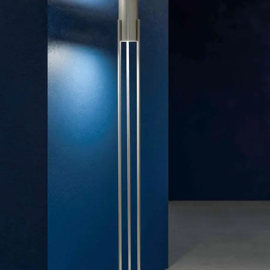 Superior Stillux The Shape floor lamp presents a minimalist design with a brushed light gray metal structure and cylindrical diffuser