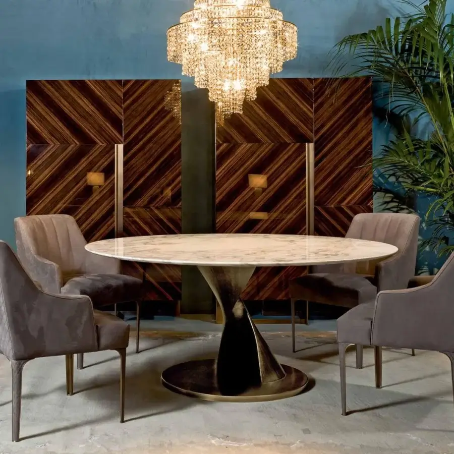 Exceptional Rugiano Zoe table with Emperador dark marble top and twisted metal base crafted in bronze with a glossy finish
