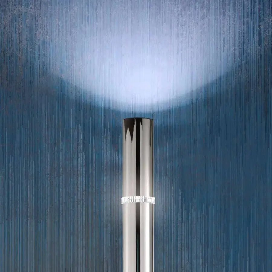 Superior Stillux Shape floor lamp exhibits a tubular metal structure with a glossy silver finish and pure crystal lighting ring