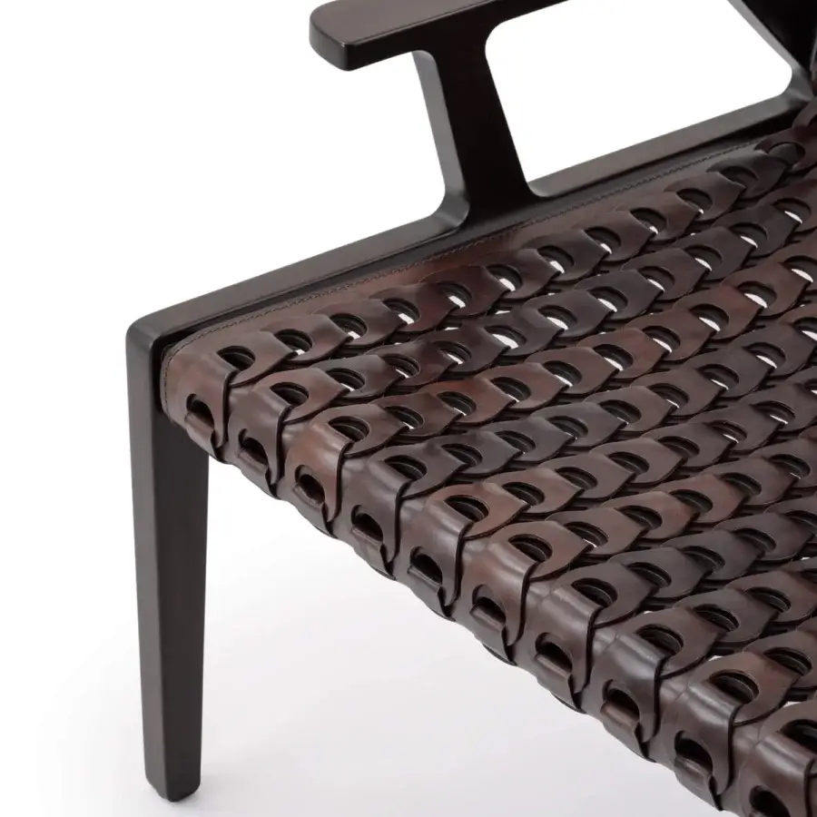 Captivating Turri Net Lounge Chair with woven saddle leather and dark-stained walnut wood construction