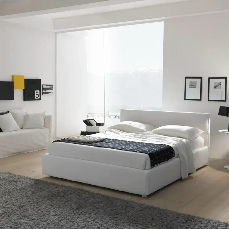 Distinguished Bolzan Letti Metropolitan bed crafted in smooth matte white textile with a seamless headboard and firwood structure