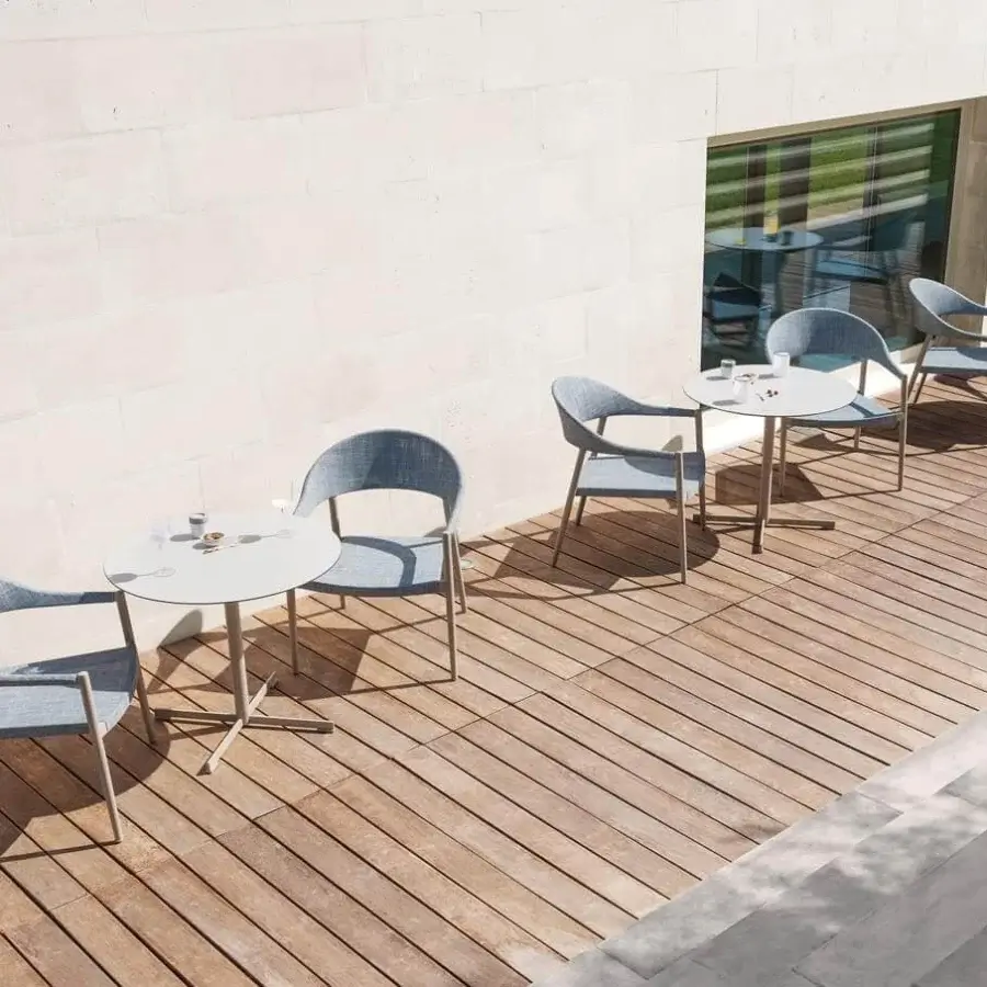 Distinguished Varaschin Summer Set Bistrot table with light gray top and matte metal finish crafted in Italy