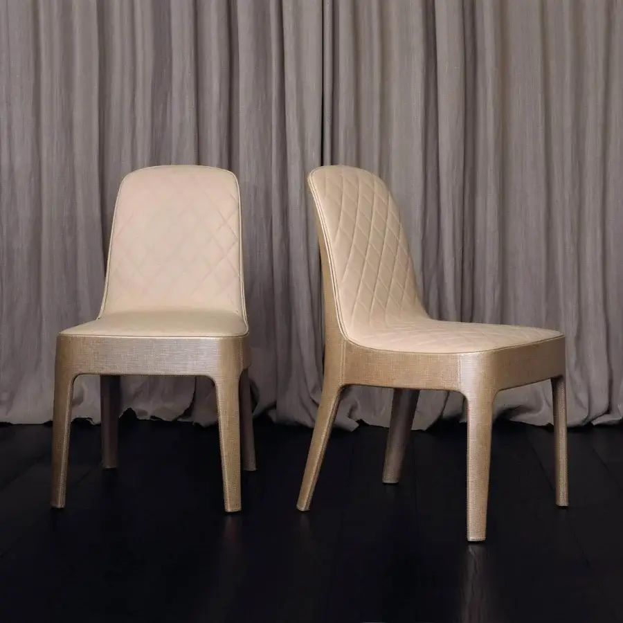 Superior Rugiano Aria chair with light beige quilted fabric and polished lacquer frame and legs