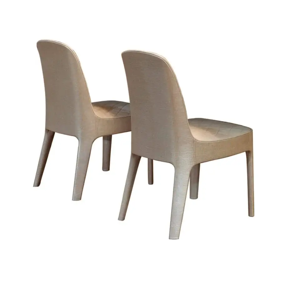 Elegant Rugiano Aria chair with light beige quilted fabric and polished lacquered legs