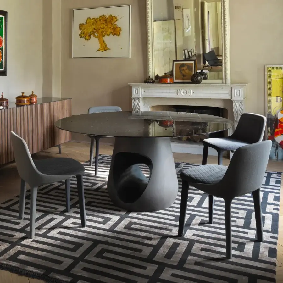 Distinguished Horm Barbara table with a marble top and concrete base displaying a monochromatic matte finish