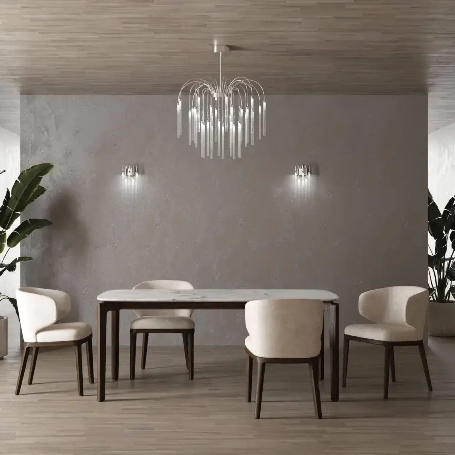 Superior Stillux Line ceiling lamp crafted with a central metal structure and thirty curved arms supporting tubular frosted pyrex glass with a silver tone