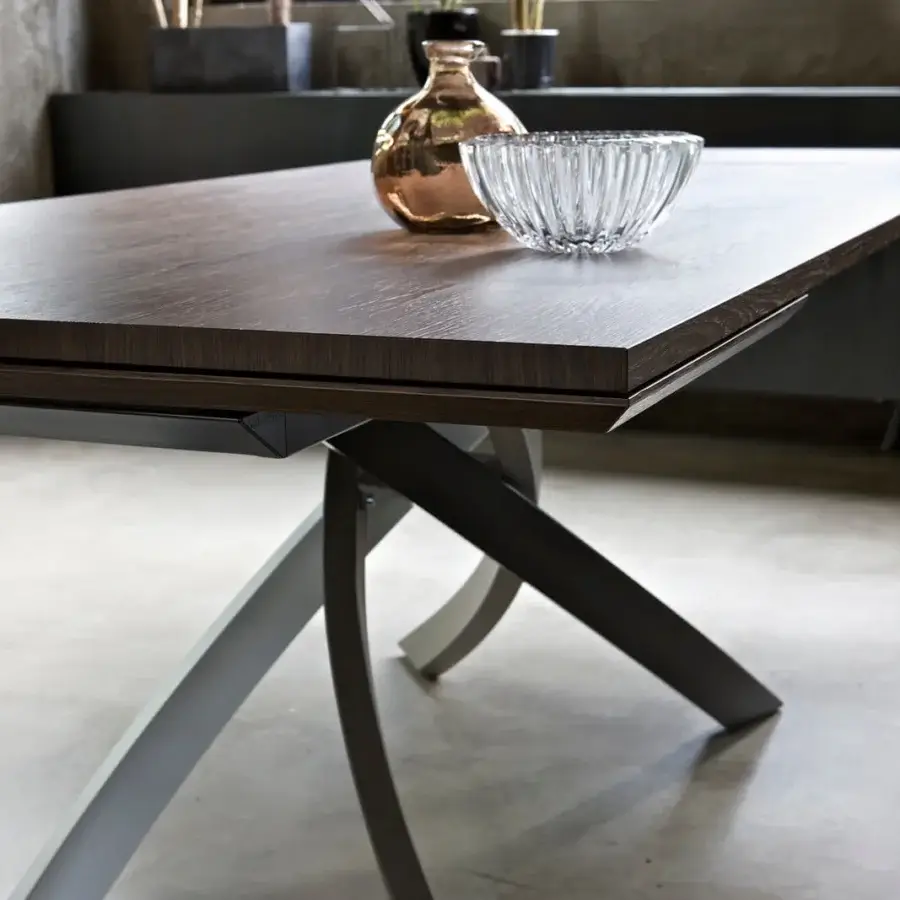 Elegant Bontempi Artistico table with a dark brown wood top and curved two-tone gray metal base crafted in Italy