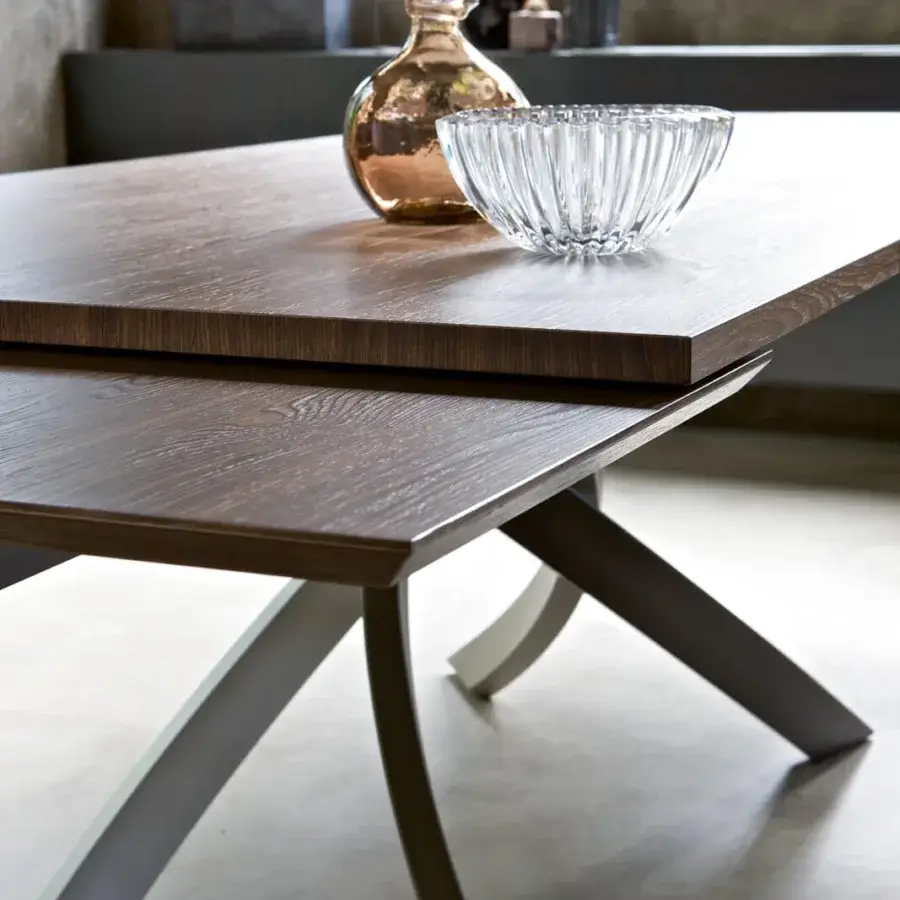 Distinctive Bontempi Artistico table with a warm brown wood tabletop and curved metal legs in contrasting grays with a matte finish