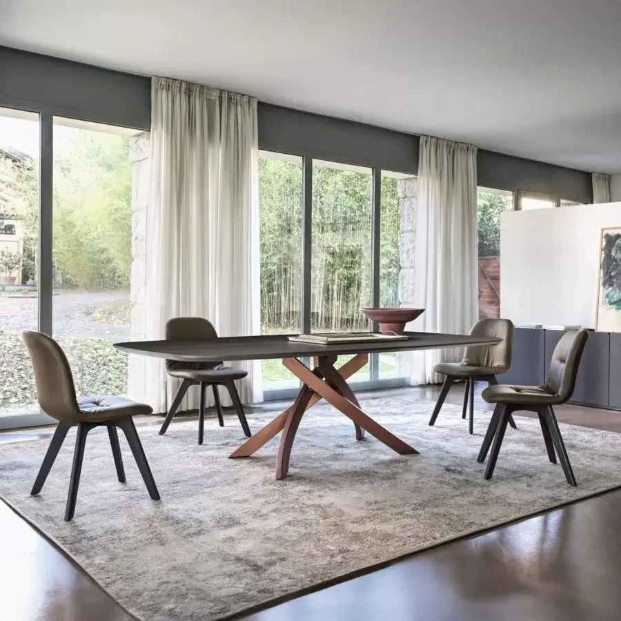 Distinguished Bontempi Artistico Barrel table with a dark stained rectangular top and intersecting lighter brown wooden supports