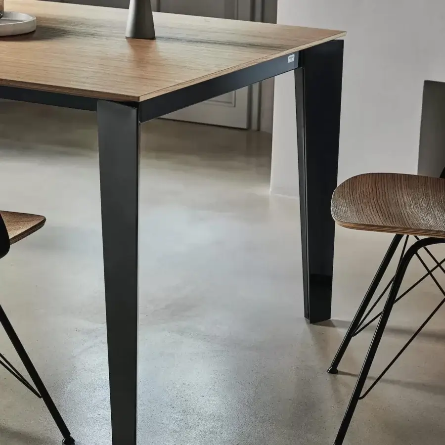 Distinguished Bontempi Cruz extendable table with wood-look tabletop and sleek black metal frame in matte finish