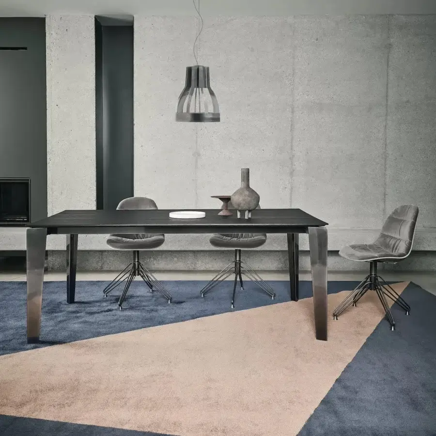 Distinguished Bontempi Cruz extendable table with dark tabletop and sleek lighter-toned metallic legs crafted in Italy