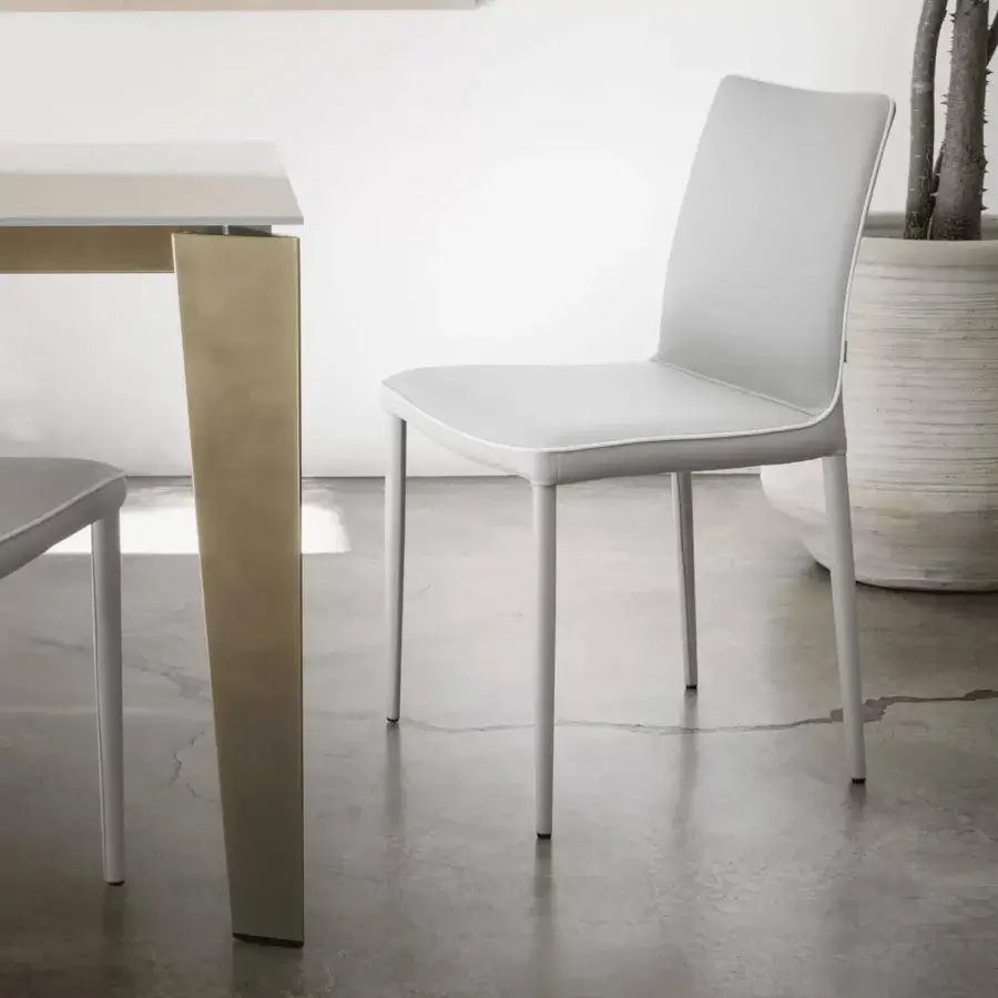Distinguished Bontempi Casa Cruz extendable table with light-colored top and angular leg in graduated metallic finish