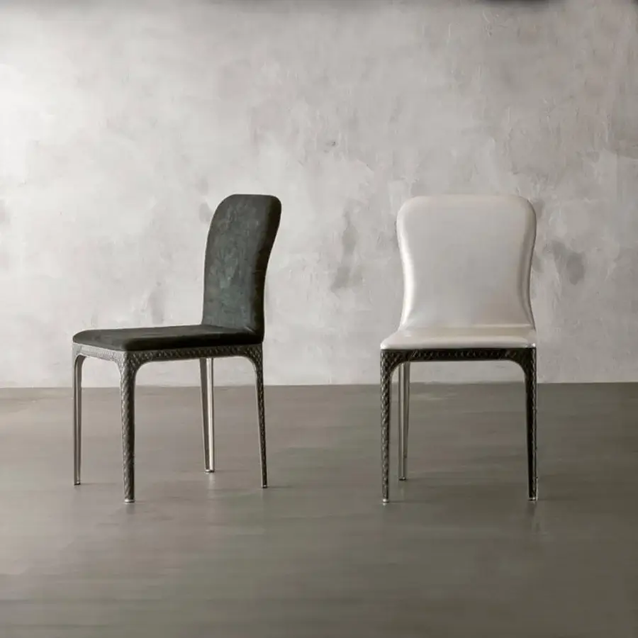 Exclusive Rugiano Viviane chair with curved back and high-end steel legs upholstered in light textile