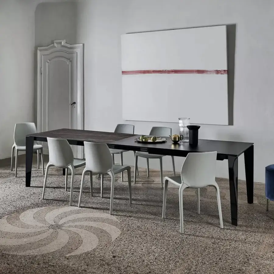 Elegant Bontempi Cruz extendable table with dark matte tabletop and sleek black metal frame crafted in Italy