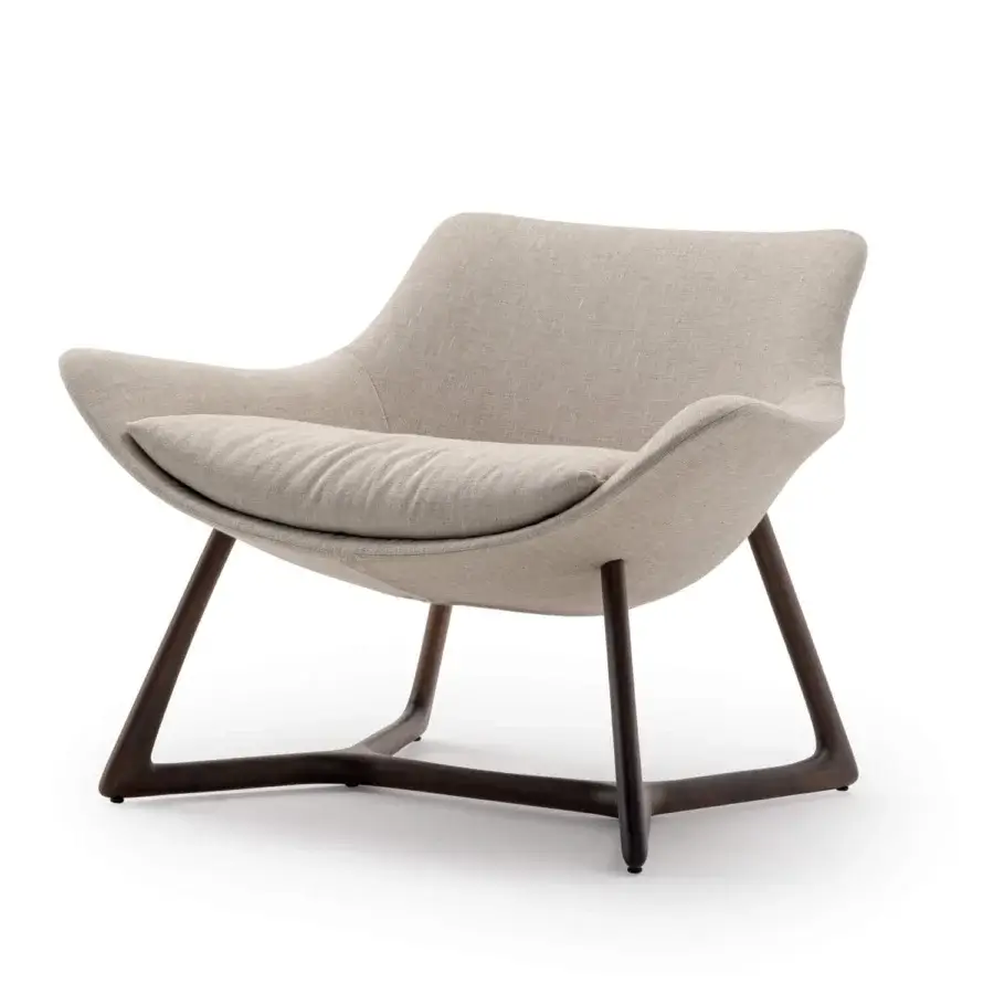 Elegant Turri Harp Lounge Chair with light beige textile and a curved silhouette built with matte walnut wood