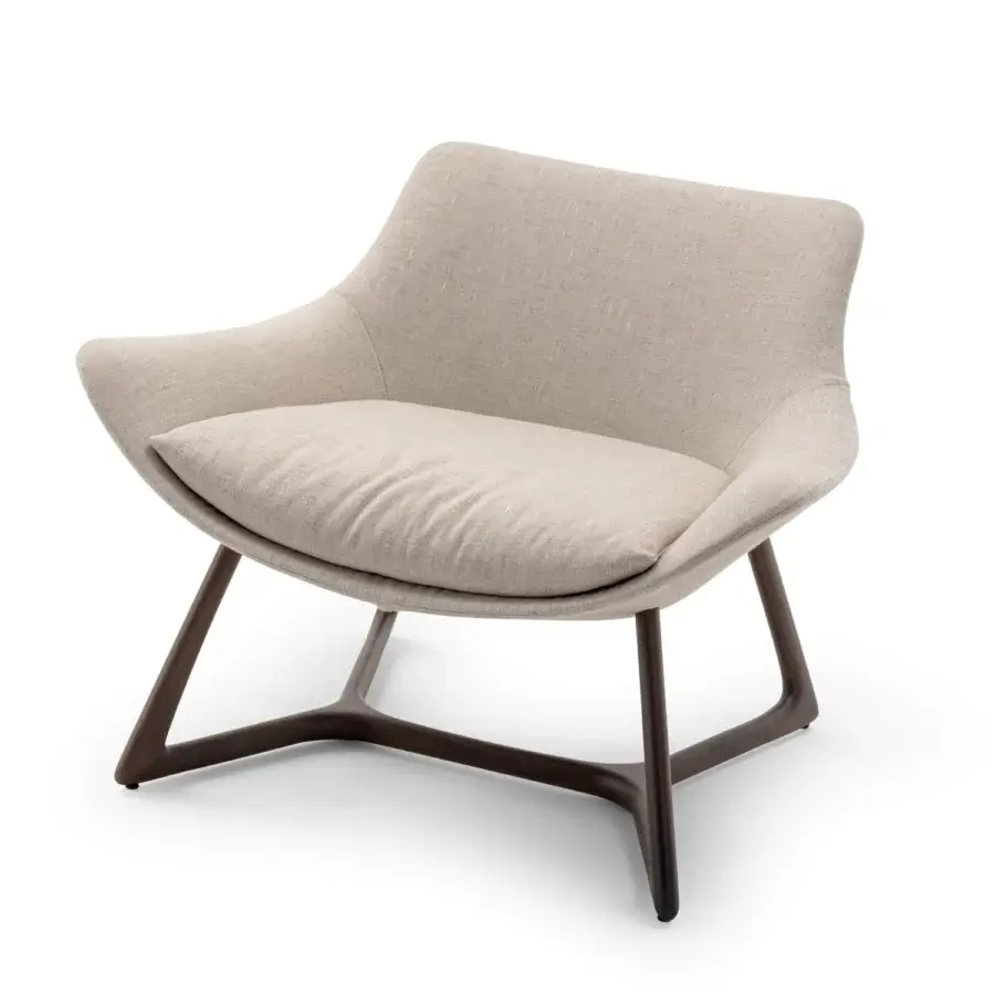 Exceptional Turri Harp Lounge Chair with curved lines, light beige textile upholstery and solid walnut wood base